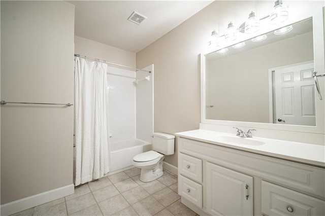bathroom featuring baseboards, toilet, vanity, shower / bath combo, and tile patterned flooring