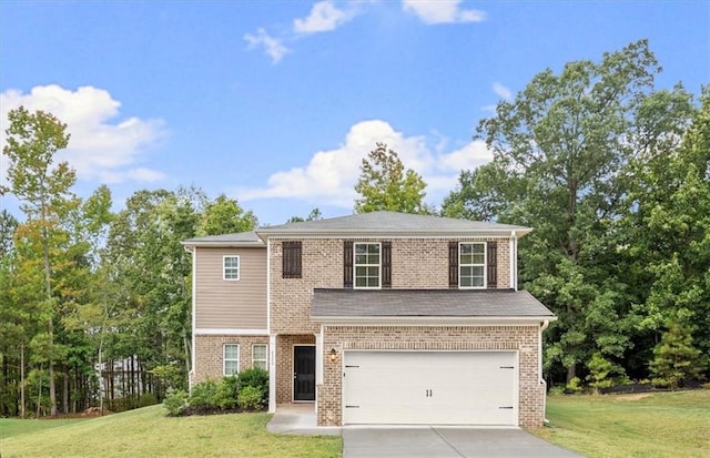 view of front facade with a garage and a front yard