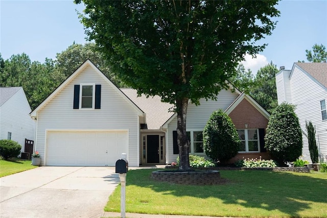 3050 Baymount Dr, Lawrenceville, GA 30043 - traditional-style home featuring driveway, a front lawn, and an attached garage