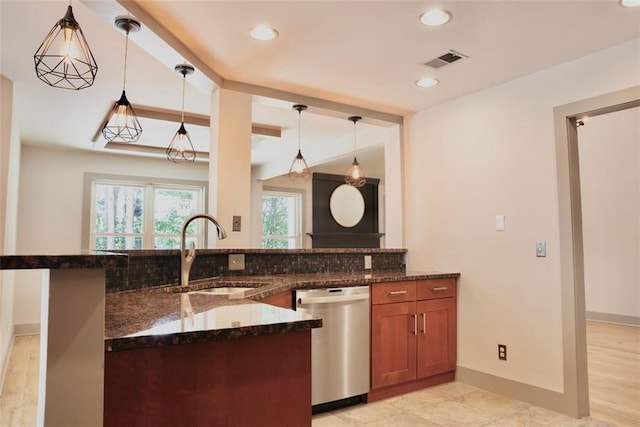 3050 Baymount Dr, Lawrenceville, GA 30043 - kitchen featuring stainless steel dishwasher, dark stone countertops, backsplash, brown cabinets, and recessed lighting
