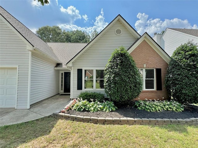 3050 Baymount Dr, Lawrenceville, GA 30043 - view of front of house featuring brick siding and a shingled roof
