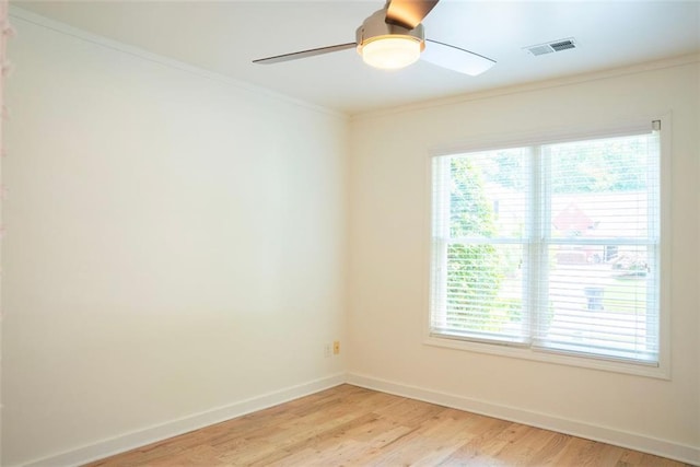 3050 Baymount Dr, Lawrenceville, GA 30043 - unfurnished room featuring crown molding, ceiling fan, and light wood-type flooring