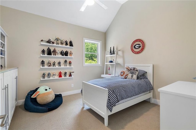 bedroom featuring baseboards, a ceiling fan, light colored carpet, and lofted ceiling