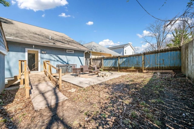 view of yard with a fenced backyard and a patio area