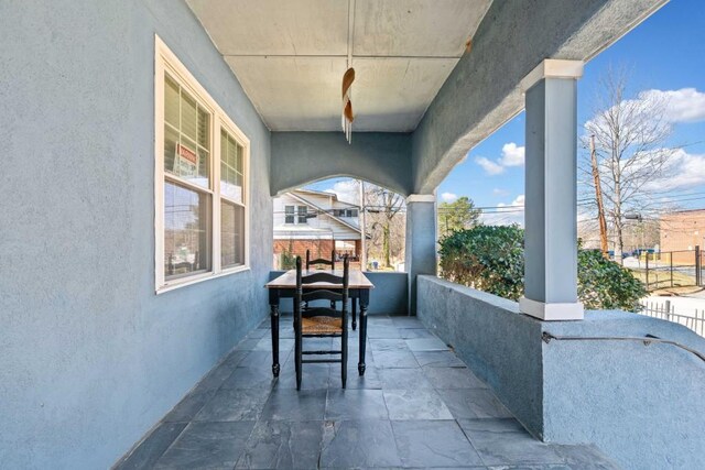 view of patio / terrace featuring a balcony