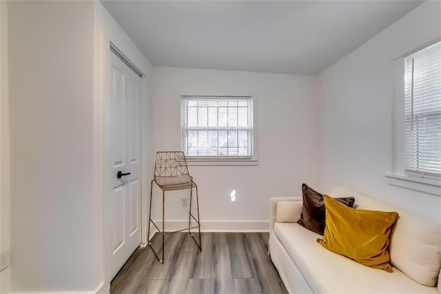 living area featuring hardwood / wood-style floors