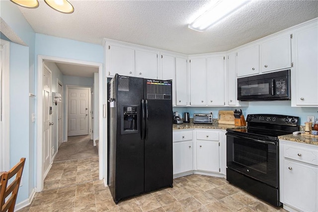 kitchen with light stone counters, a textured ceiling, black appliances, and white cabinets