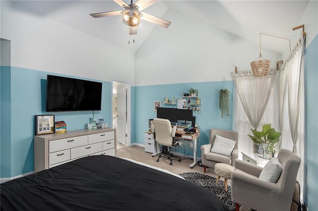 carpeted bedroom with high vaulted ceiling and ceiling fan