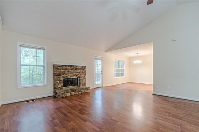 unfurnished living room with a fireplace, hardwood / wood-style flooring, and high vaulted ceiling