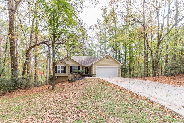 single story home with a garage