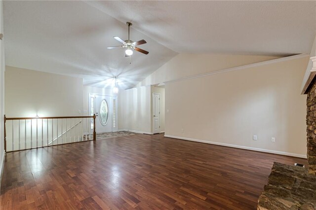 bonus room featuring lofted ceiling, ceiling fan, a fireplace, and dark hardwood / wood-style flooring