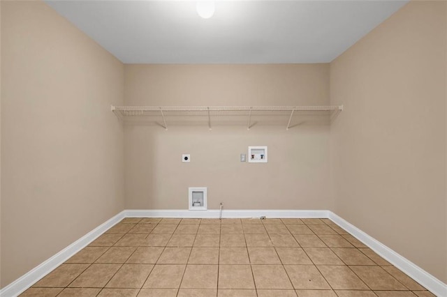4499 Bellemeade Dr, Douglasville, GA 30135 - laundry room featuring electric dryer hookup, light tile patterned floors, baseboards, laundry area, and washer hookup