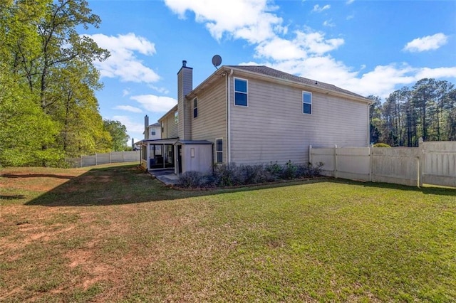 4499 Bellemeade Dr, Douglasville, GA 30135 - view of side of property with a lawn, a fenced backyard, and a chimney
