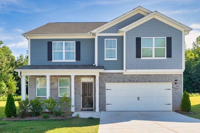 112 Russell Rd, Pendergrass, GA 30567 - view of front of house with a garage and a front lawn