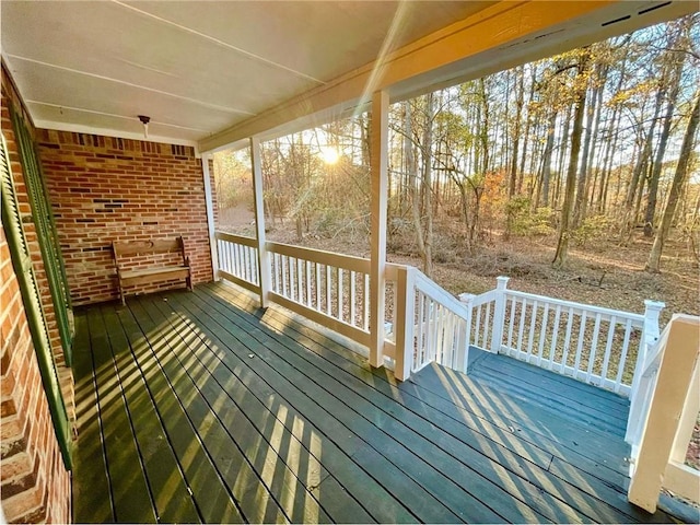 wooden terrace featuring a porch