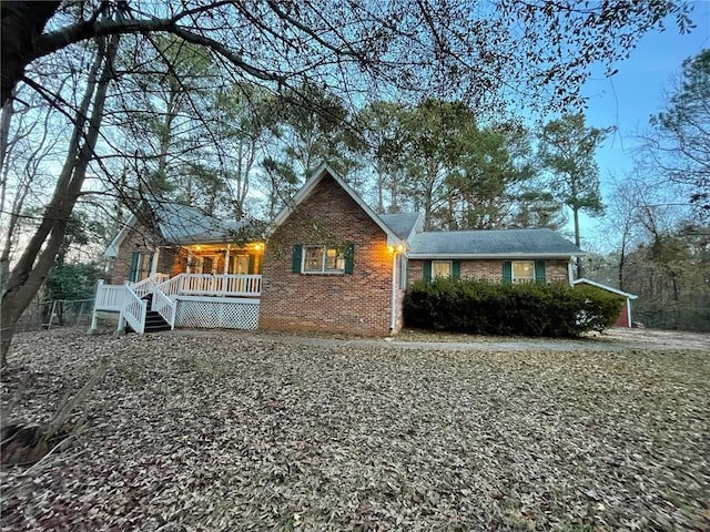 view of home's exterior with brick siding