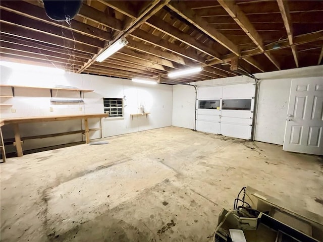 garage with a workshop area