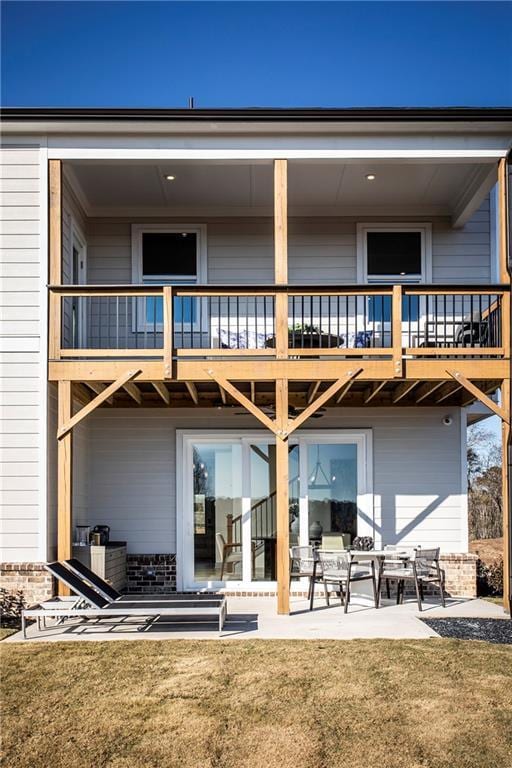 4720 Montane St, Cumming, GA 30028 - rear view of house featuring a patio area, a balcony, and a lawn