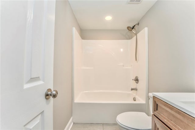 full bathroom featuring vanity, shower / bathing tub combination, tile patterned floors, and toilet