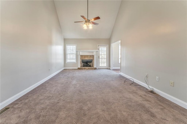 unfurnished living room featuring ceiling fan, high vaulted ceiling, and carpet