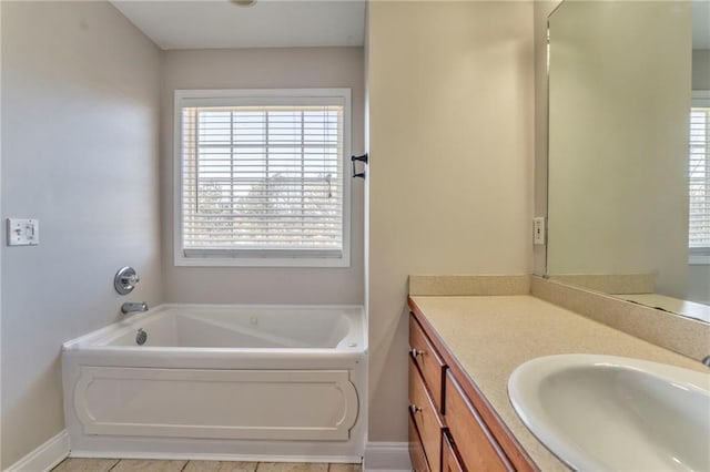 bathroom featuring vanity and a bathtub