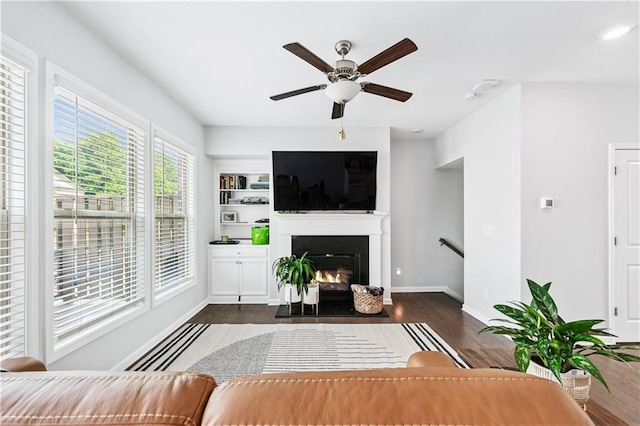 350 Provenance Dr, Atlanta, GA 30328 - living room with dark wood-style flooring, a fireplace with flush hearth, and a ceiling fan