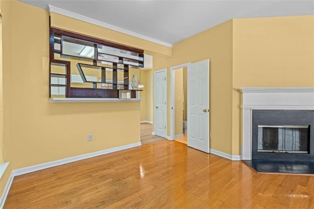 unfurnished living room with light wood-type flooring