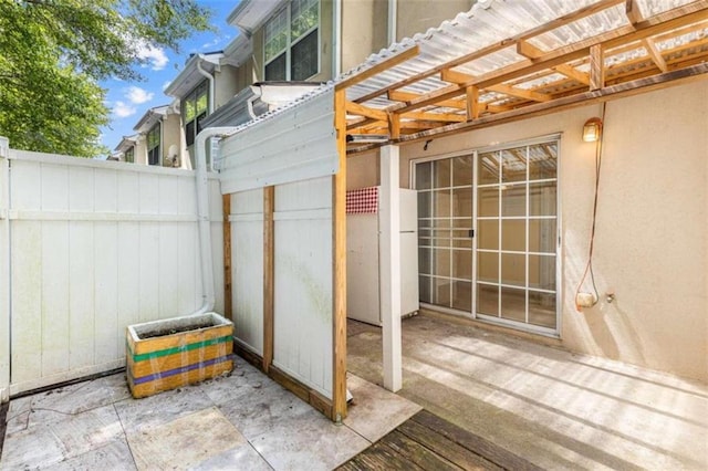 view of patio featuring a pergola