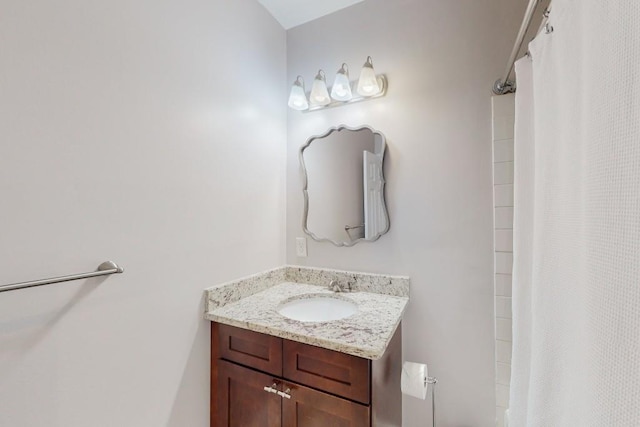 bathroom with vanity and a shower with shower curtain