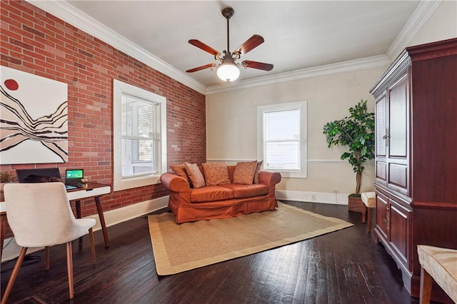 living area with dark wood-type flooring, ornamental molding, and brick wall