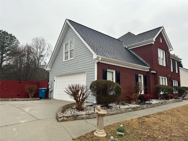 view of property exterior with a garage