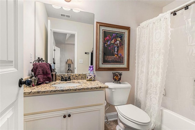 full bathroom with vanity, toilet, and shower / tub combo with curtain