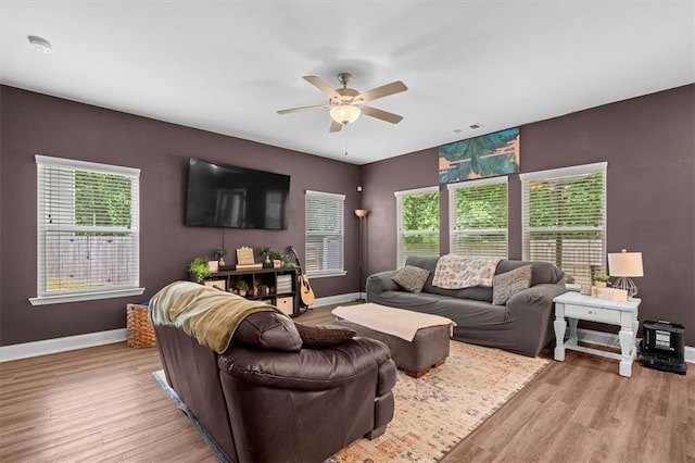 560 Vandenburg Dr, Villa Rica, GA 30180 - living area featuring light wood-type flooring, ceiling fan, and plenty of natural light