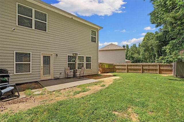 560 Vandenburg Dr, Villa Rica, GA 30180 - rear view of house featuring a fenced backyard and a patio
