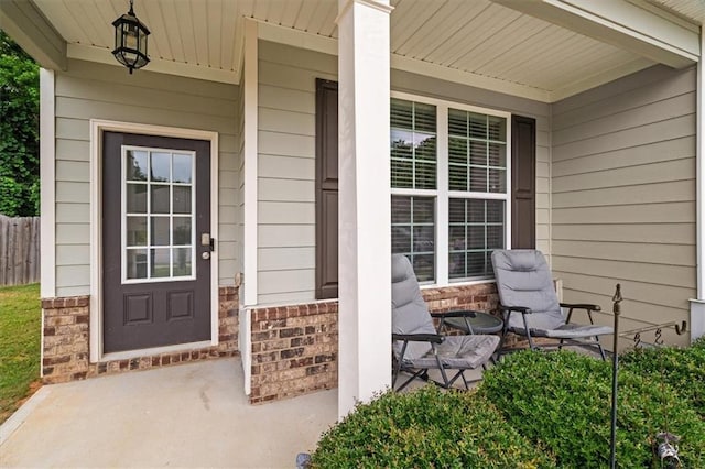 560 Vandenburg Dr, Villa Rica, GA 30180 - property entrance featuring covered porch and brick siding