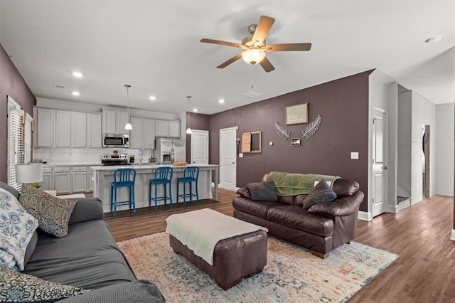 560 Vandenburg Dr, Villa Rica, GA 30180 - living room with wood finished floors, ceiling fan, and recessed lighting