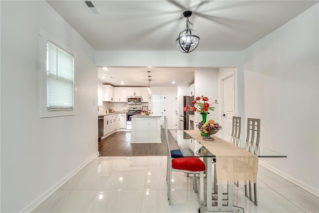 view of tiled dining space