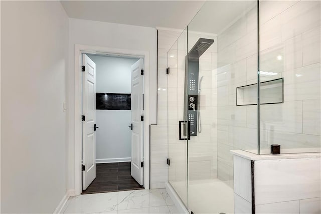 bathroom with an enclosed shower