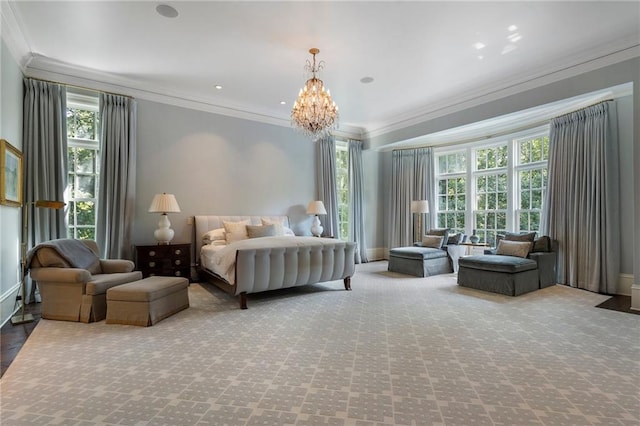 bedroom with a notable chandelier, recessed lighting, and ornamental molding