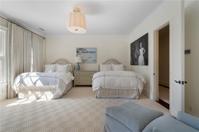 carpeted bedroom with crown molding