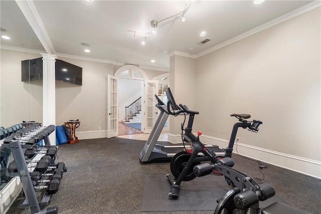 exercise room featuring baseboards, visible vents, decorative columns, recessed lighting, and ornamental molding