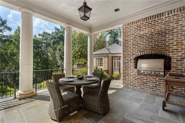 sunroom featuring decorative columns