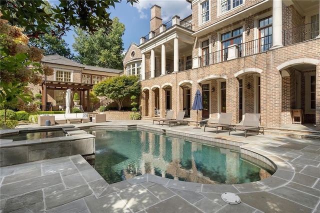 view of pool featuring a patio and a pergola