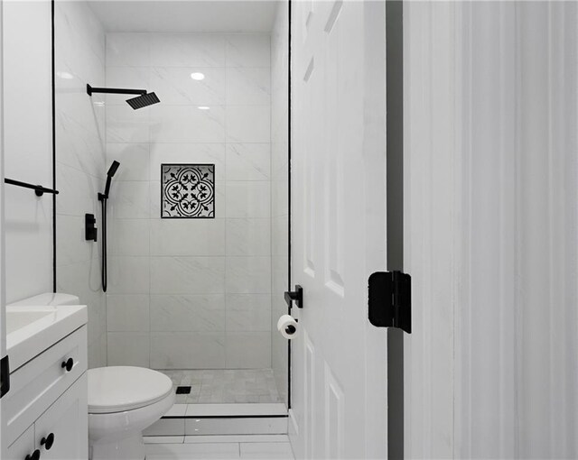 1097 Hubbard St SW, Atlanta, GA 30310 - bathroom featuring tiled shower, vanity, and toilet