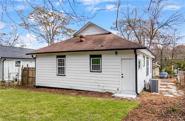 1097 Hubbard St SW, Atlanta, GA 30310 - back of property featuring a lawn and cooling unit