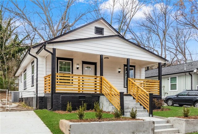 1097 Hubbard St SW, Atlanta, GA 30310 - view of front of house featuring covered porch