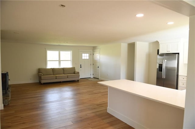 446 Brown Bridge Rd, Chatsworth, GA 30705 - living room featuring baseboards, light wood-style floors, and recessed lighting