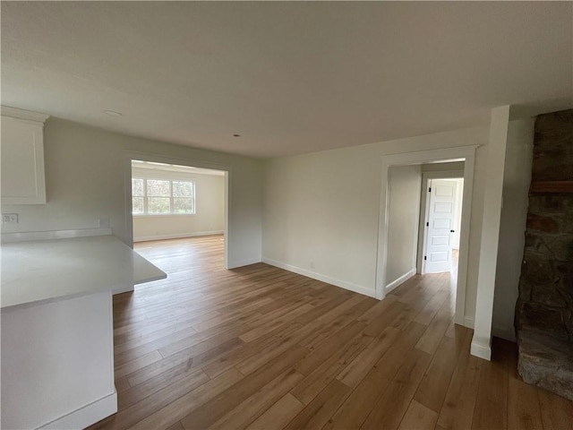 446 Brown Bridge Rd, Chatsworth, GA 30705 - empty room with wood finished floors and baseboards