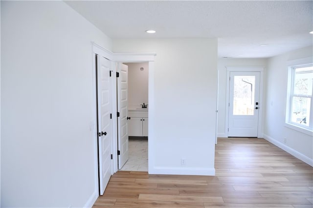 446 Brown Bridge Rd, Chatsworth, GA 30705 - foyer with light wood-style flooring, baseboards, and recessed lighting