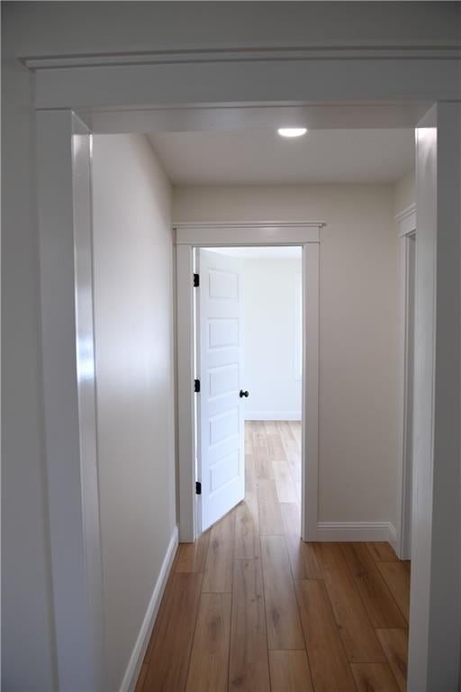 446 Brown Bridge Rd, Chatsworth, GA 30705 - hall with baseboards, wood finished floors, and recessed lighting
